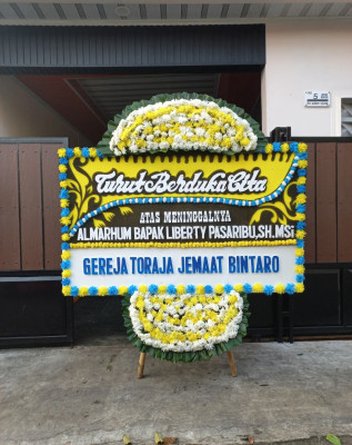 Papan Bunga Duka di Mugirejo